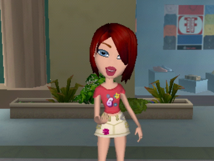 Phoebe has short deep red hair and pale skin. She wears a pink shirt with flowers and the number 6 on the front and a short tan skirt with a pink flower on it. Her eyes are blue.